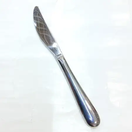 #1084-29; Stainless steel dessert knife..