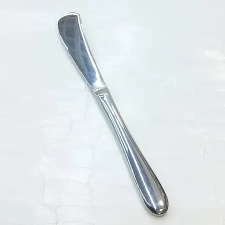 #1084B-51; Stainless steel butter knife..