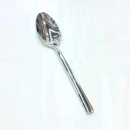 #1194-4; Stainless steel tea spoon..
