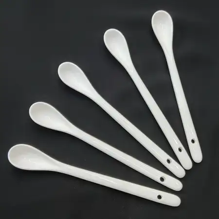 #KFS1; Ceramic white coffee spoon 1x6..